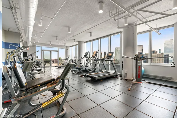 a view of chairs and tables in the patio