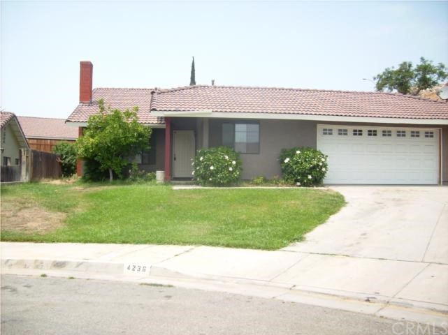 4236 Cirrus Way Riverside, CA 92503 - Photo 1 of 1 a front view of a house with a garden