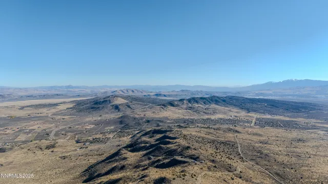 a view of beach and a mountain