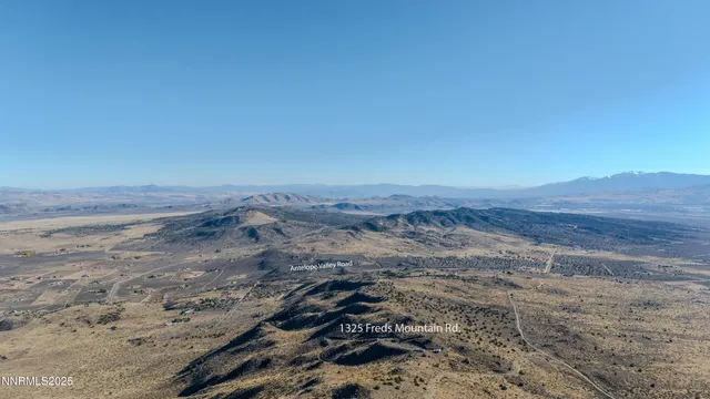 a view of beach and a mountain