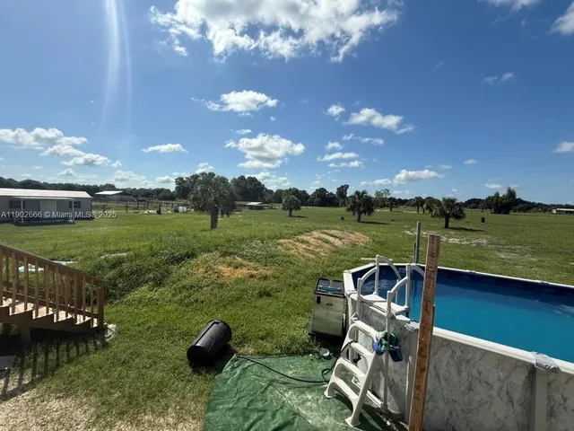 a view of a golf course with a lake