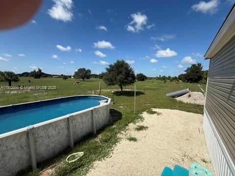 1250 Homestead Avenue Clewiston, FL 33440 - Photo 19 of 32 a view of a lake from a balcony