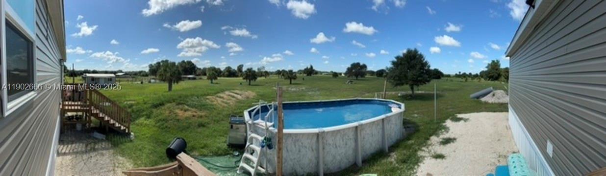 1250 Homestead Avenue Clewiston, FL 33440 - Photo 21 of 32 a balcony with lots of green space