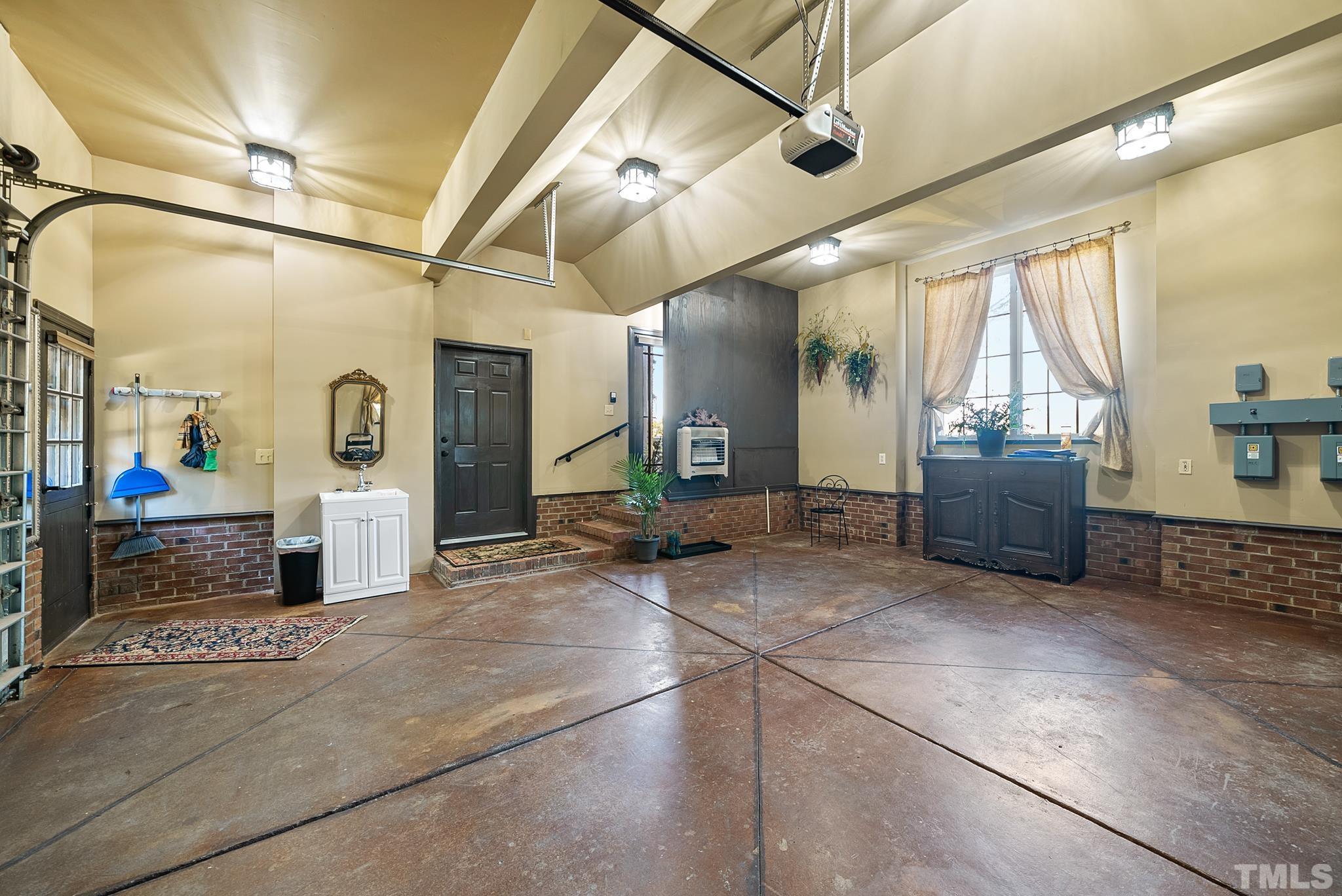 104 Pope Lake Road Angier, NC 27501 - Photo 22 of 49 a living room with furniture and a chandelier