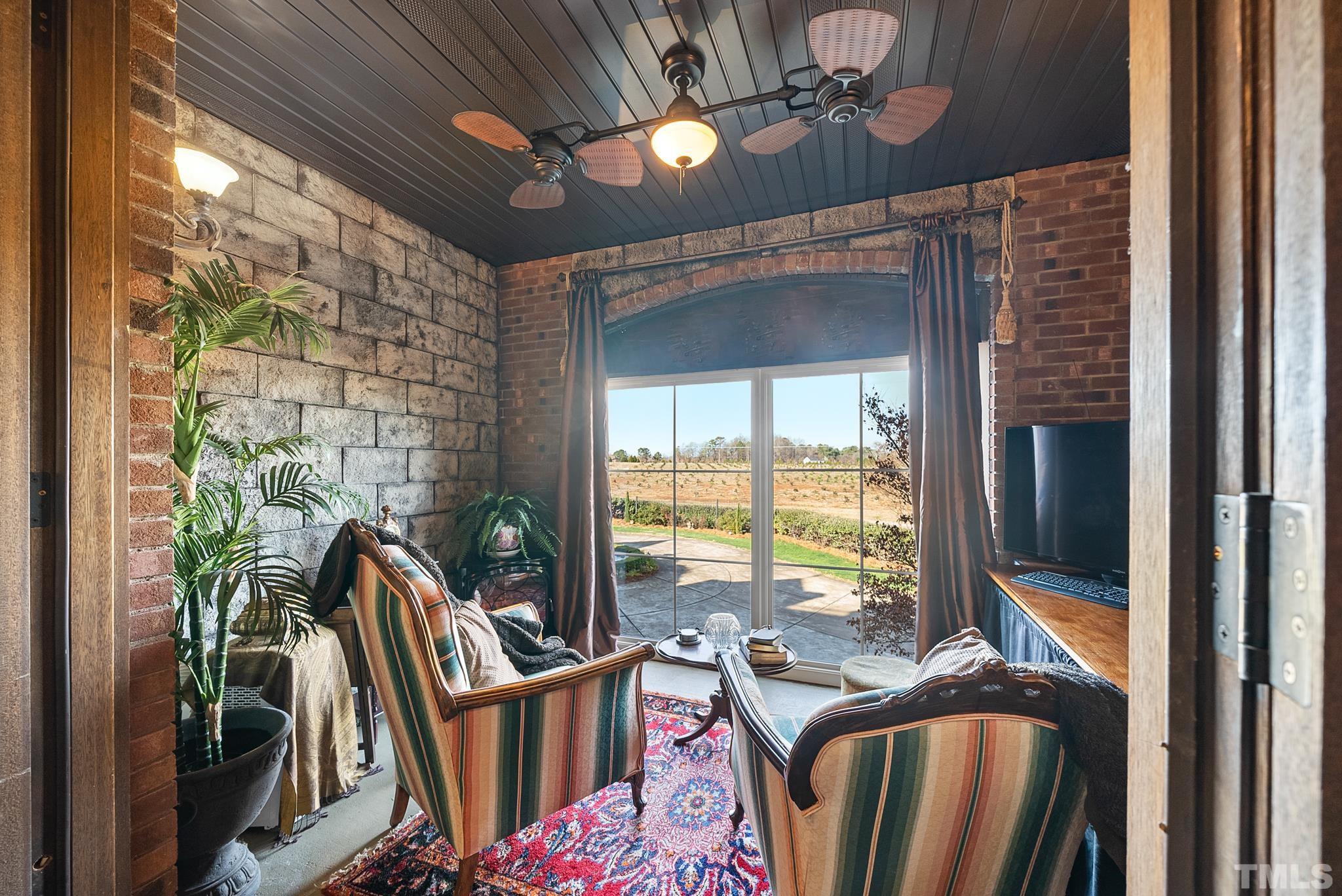 104 Pope Lake Road Angier, NC 27501 - Photo 29 of 49 a view of a balcony with furniture