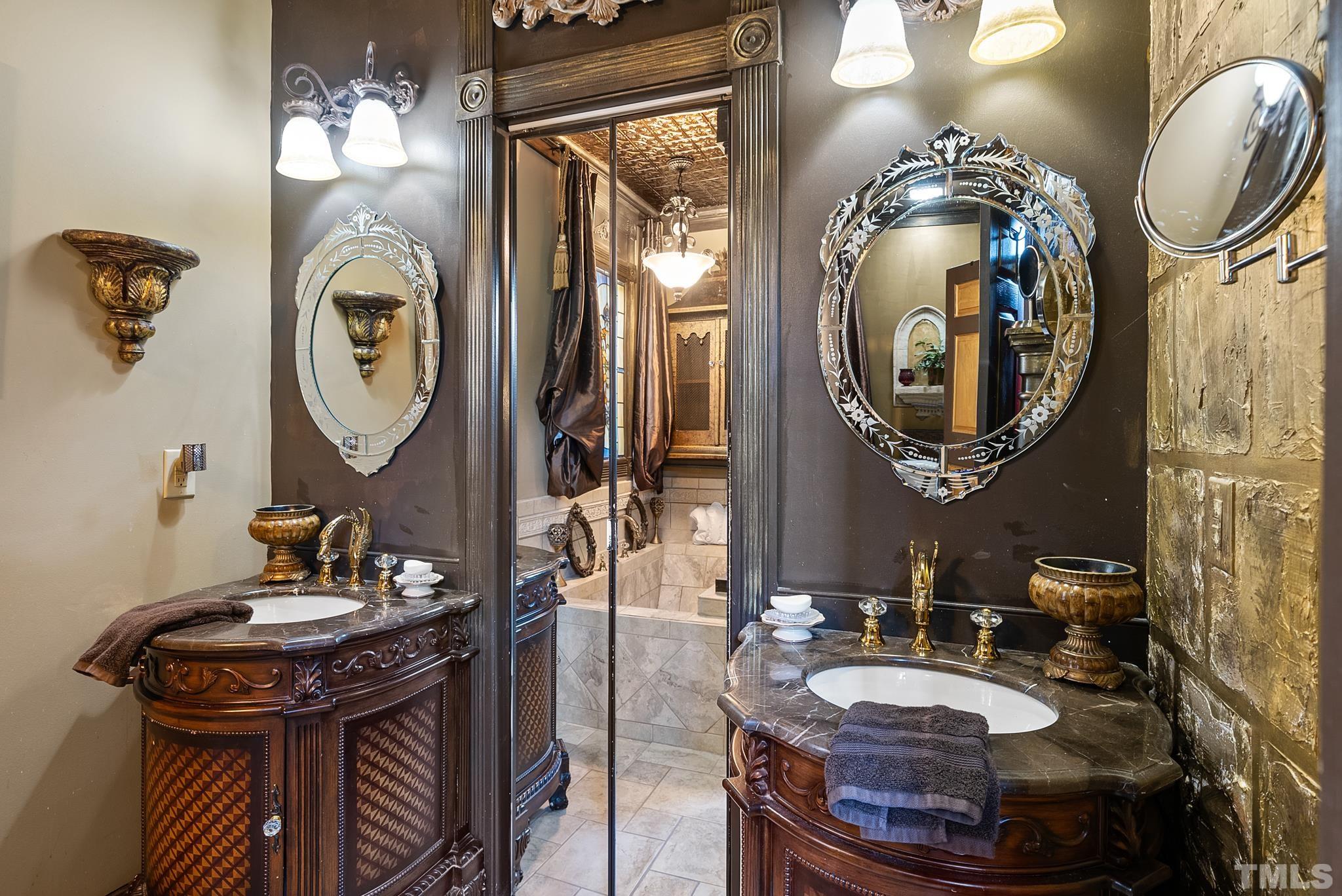 104 Pope Lake Road Angier, NC 27501 - Photo 34 of 49 a bathroom with a sink and a mirror