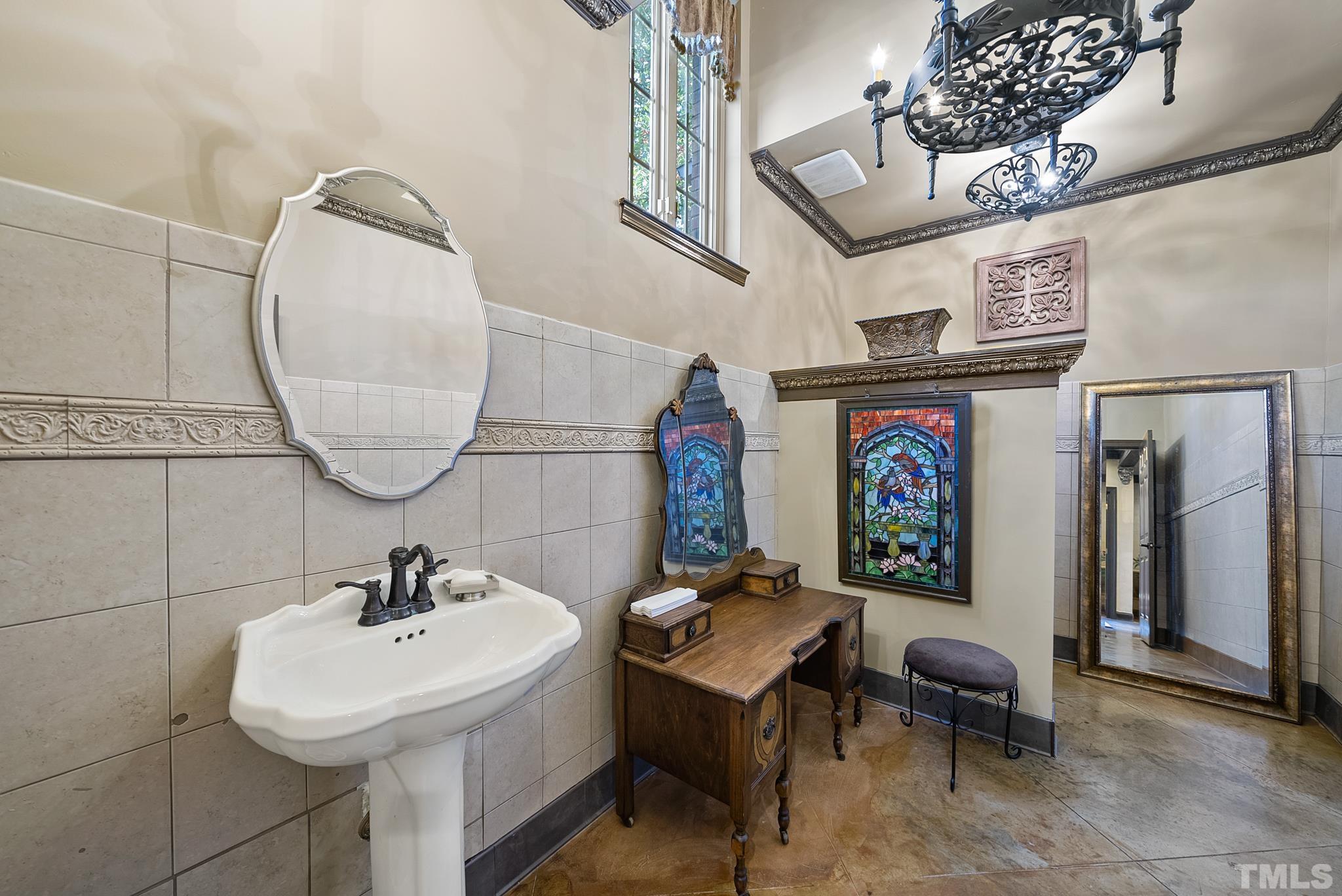 104 Pope Lake Road Angier, NC 27501 - Photo 45 of 49 a bathroom with a sink and mirror
