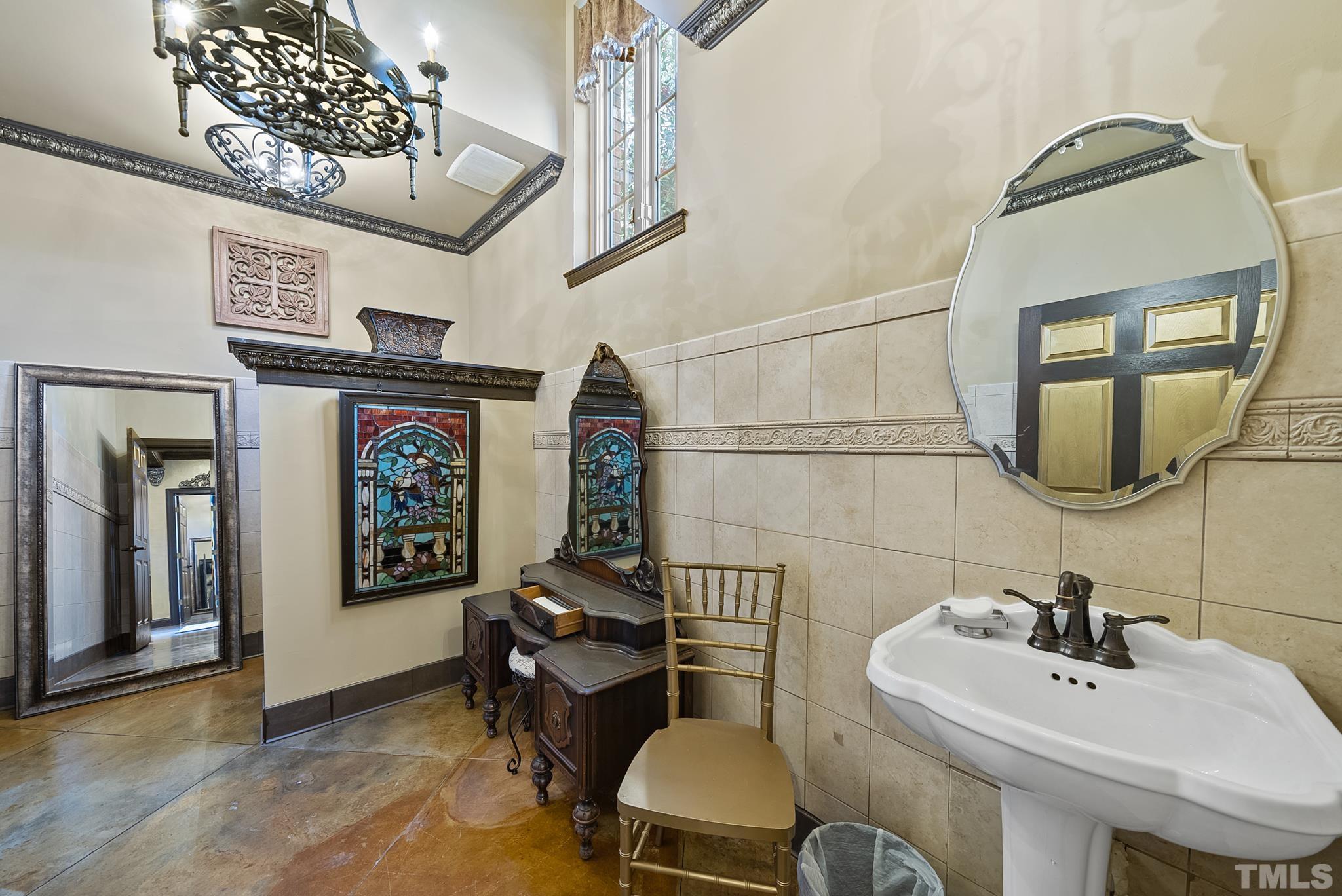 104 Pope Lake Road Angier, NC 27501 - Photo 46 of 49 a bathroom with a sink mirror and toilet