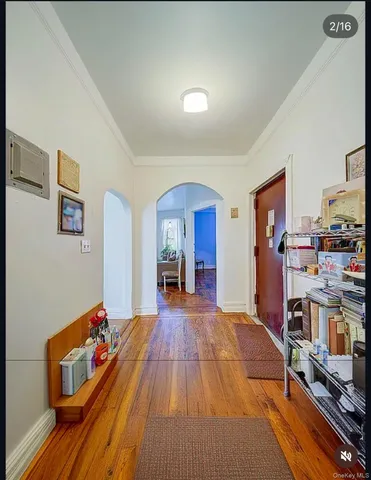 a bed room with a bed and a book shelf