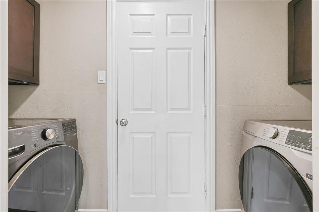 7636 Castillo Road Fort Worth, TX 76112 - Photo 11 of 28 a utility room with dryer and washer