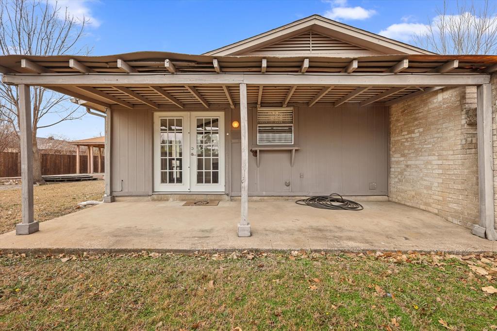 7636 Castillo Road Fort Worth, TX 76112 - Photo 25 of 28 a front view of a house with parking area