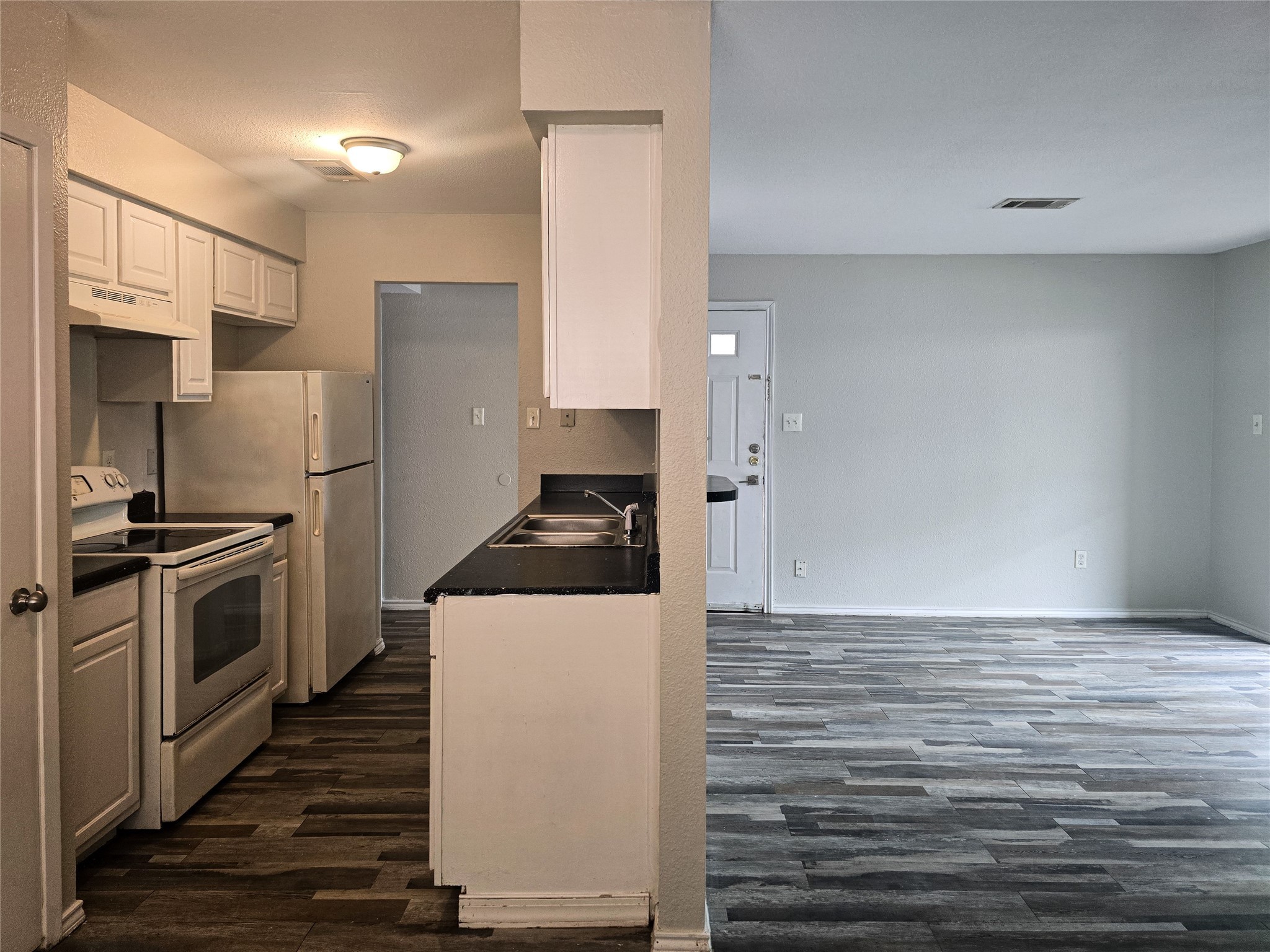 396 Duroux Road, Unit B La Marque, TX 77568 - Photo 4 of 9 a kitchen with stainless steel appliances a refrigerator and a stove