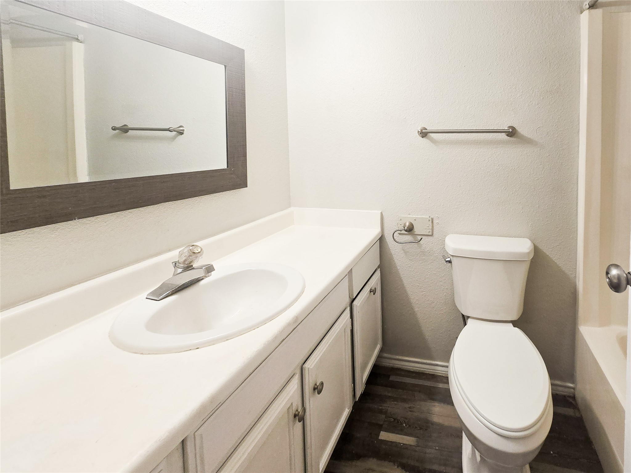 396 Duroux Road, Unit B La Marque, TX 77568 - Photo 8 of 9 a bathroom with a sink toilet and mirror