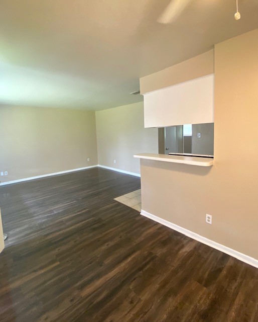 3206 Lobit Drive, Unit 14 Dickinson, TX 77539 - Photo 11 of 11 an empty room with wooden floor