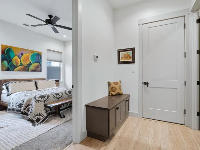 a bedroom with bed and a window