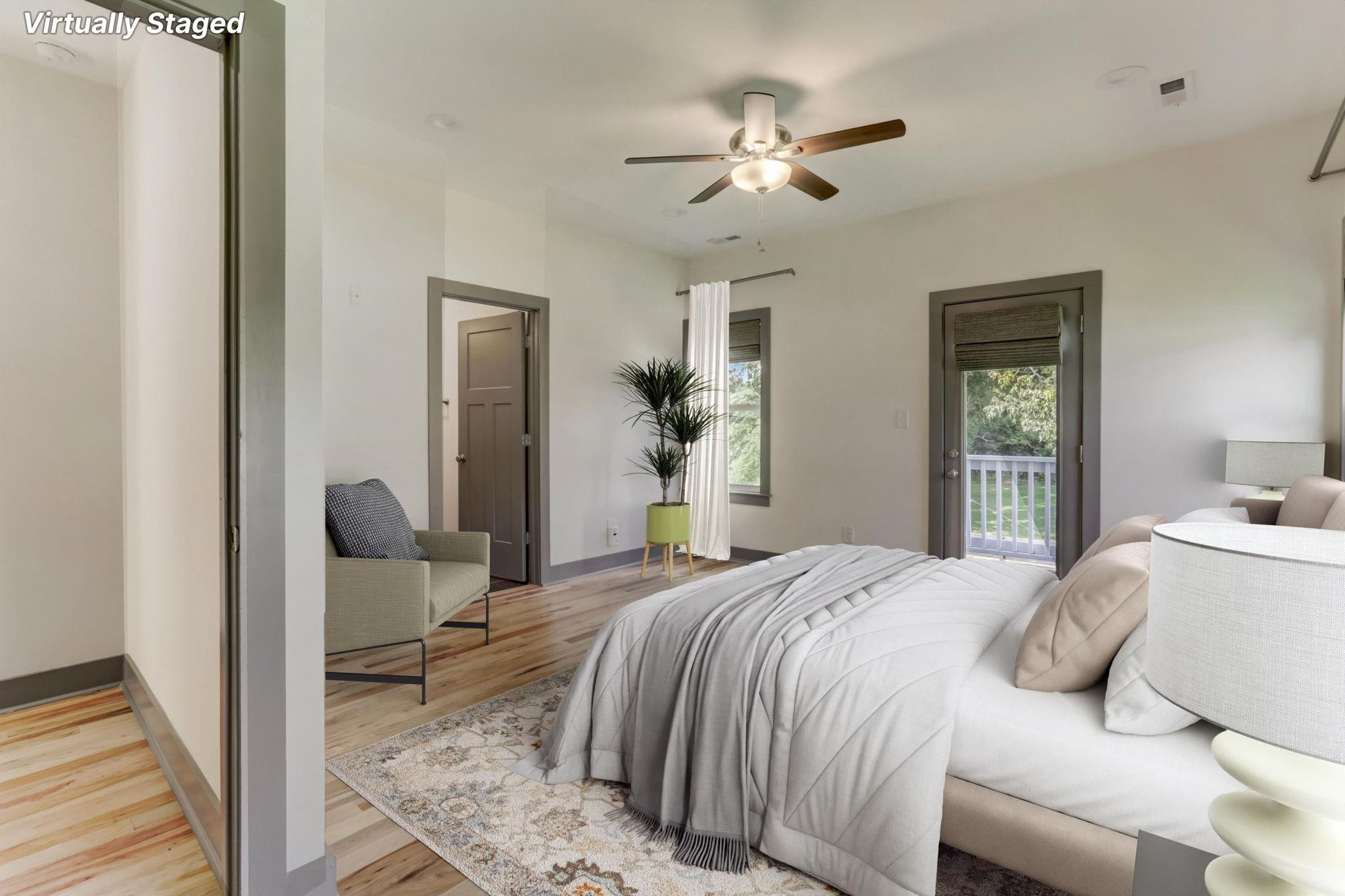 7 Hill Street Raleigh, NC 27610 - Photo 13 of 25 a bedroom with a bed and a chandelier