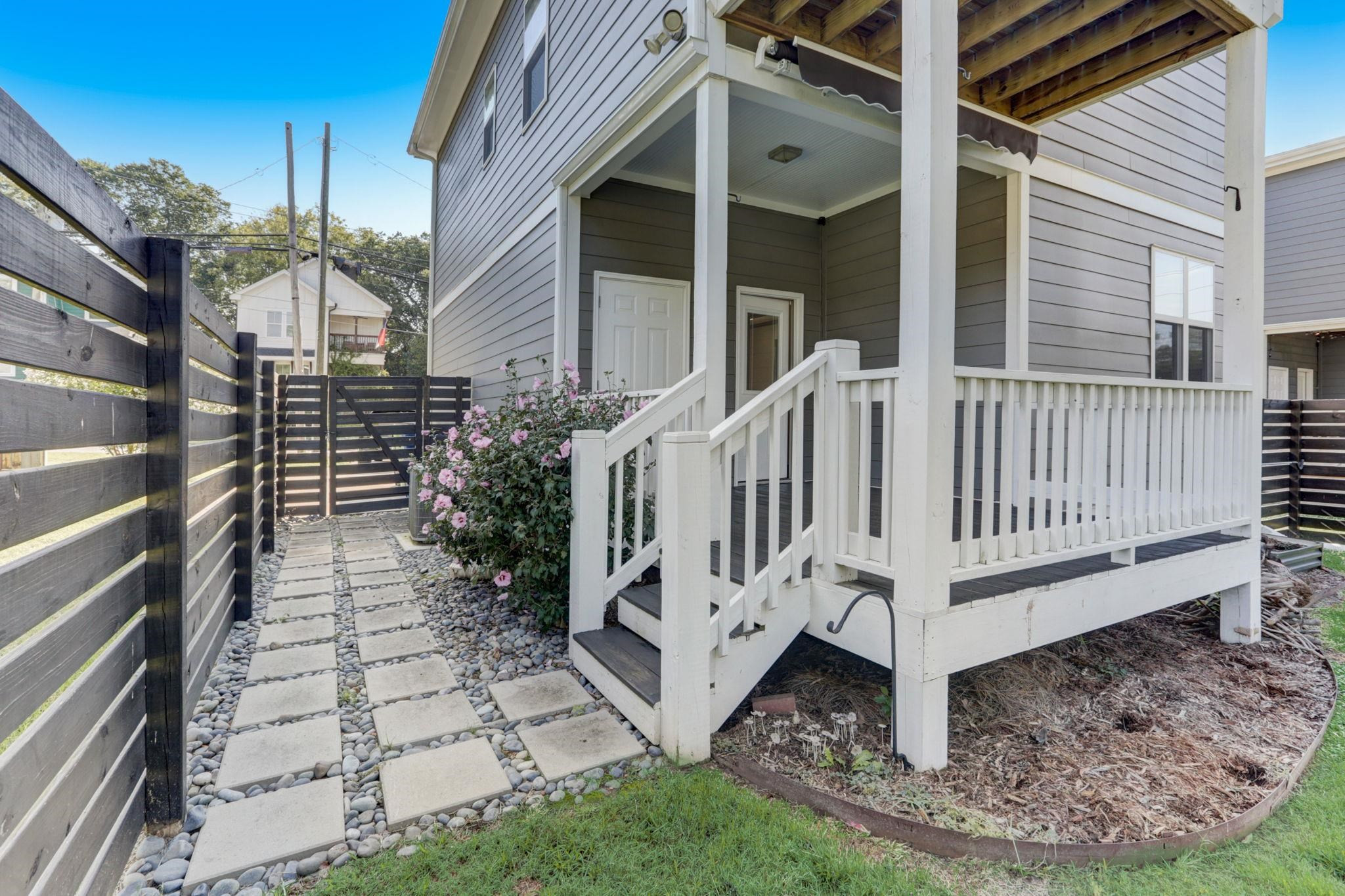 7 Hill Street Raleigh, NC 27610 - Photo 23 of 25 a view of a small yard in front of a house