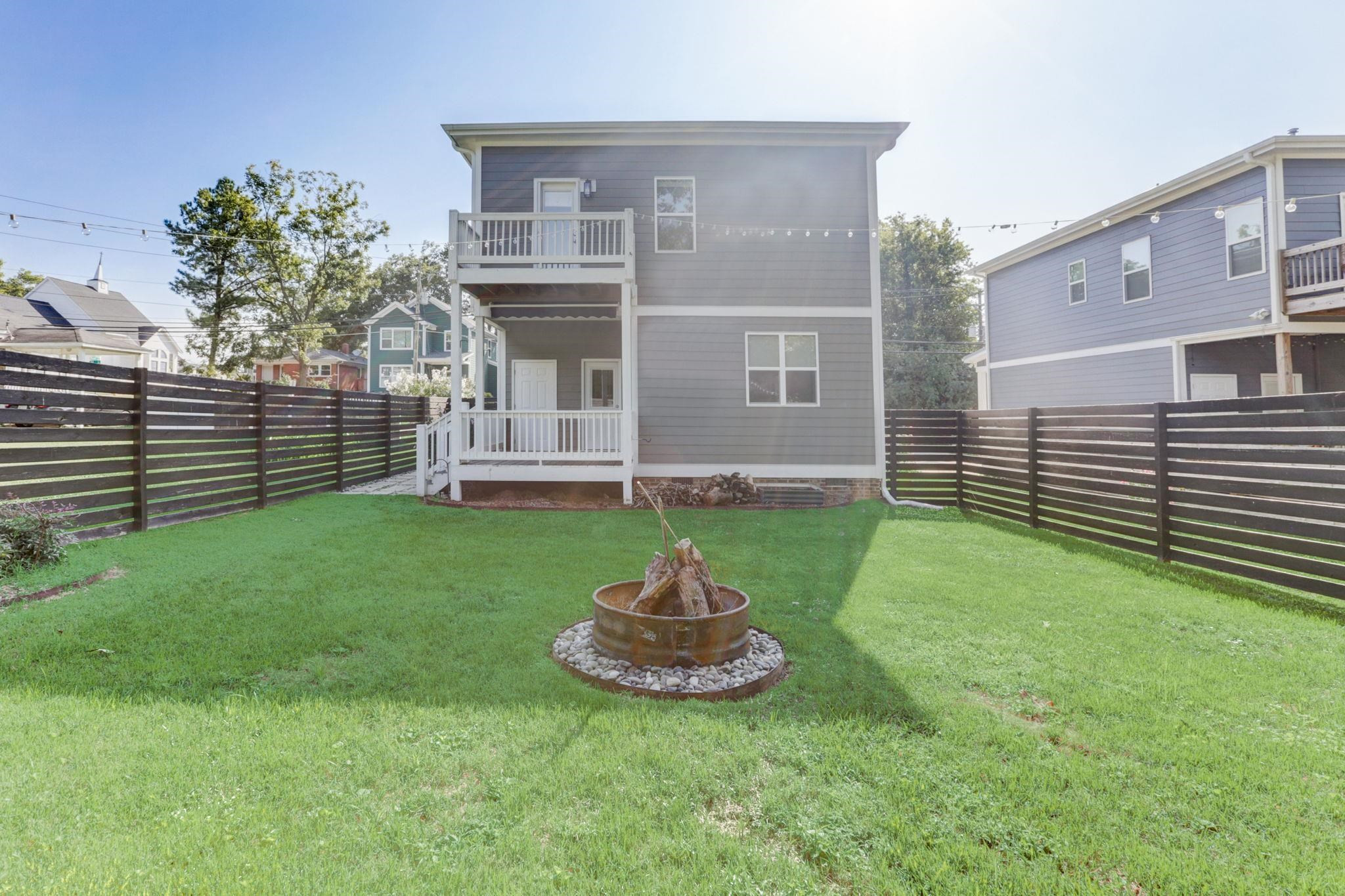 7 Hill Street Raleigh, NC 27610 - Photo 24 of 25 a front view of a house with a garden