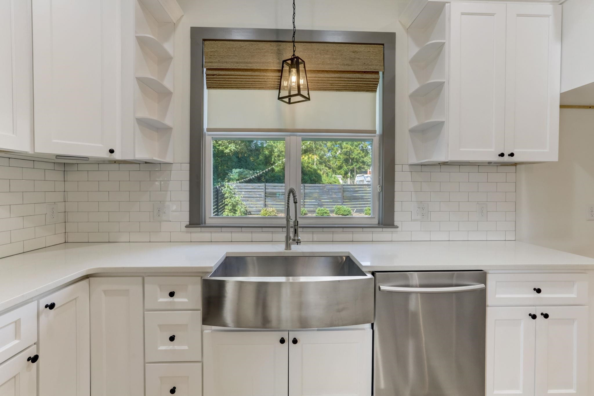 7 Hill Street Raleigh, NC 27610 - Photo 10 of 25 a kitchen with a sink and a window