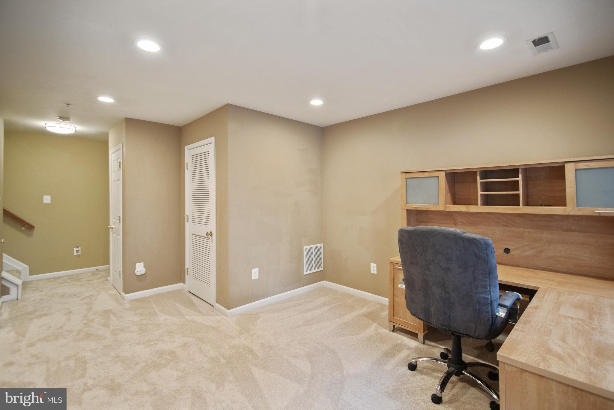 7171 Water Oak Road, Unit 175 Elkridge, MD 21075 - Photo 34 of 49 7171 WATER OAK-BASEMENT REC/OFFICE W/ LAUNDRY VIEW
