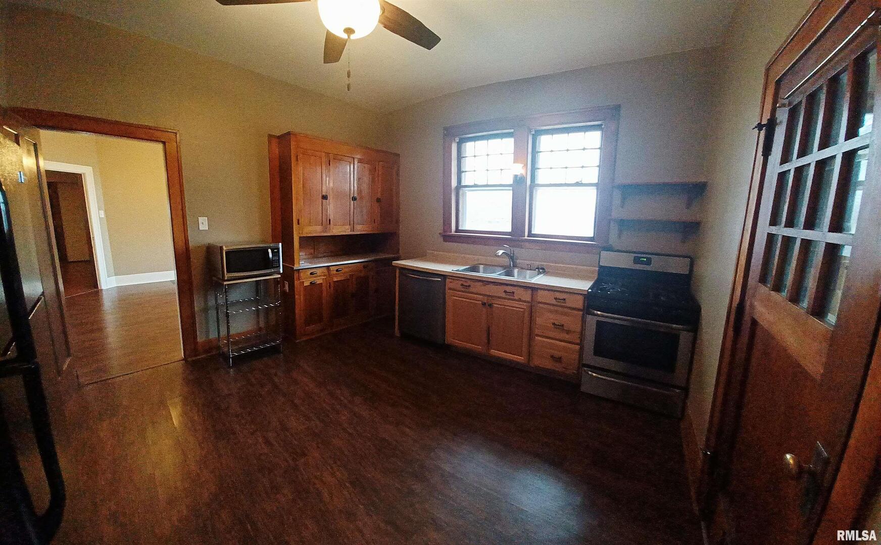 125 A Street Buda, IL 61314 - Photo 14 of 29 a kitchen with stainless steel appliances granite countertop a refrigerator a stove a sink and dishwasher