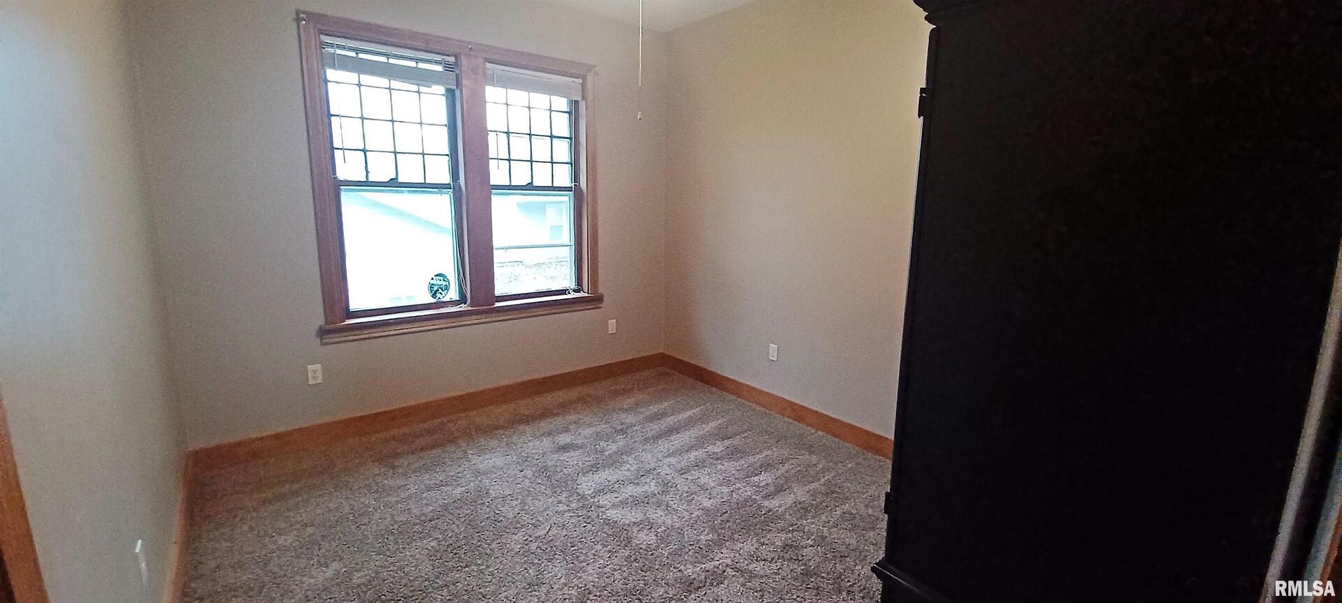 125 A Street Buda, IL 61314 - Photo 24 of 29 an empty room with a window