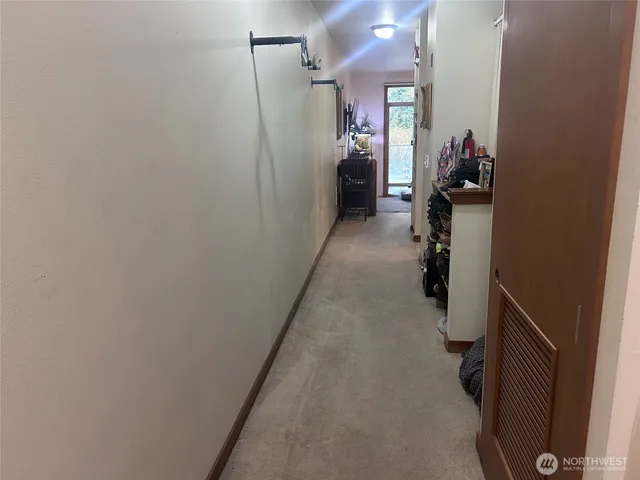 a view of parking garage with cars