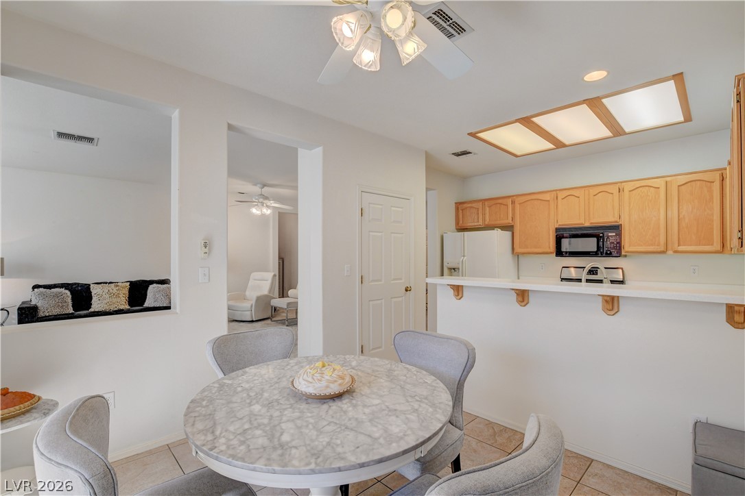2165 Chapman Ranch Drive Henderson, NV 89012 - Photo 16 of 38 Kitchen, dining room and living room