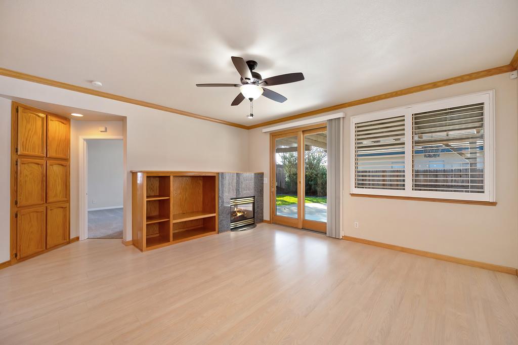 9594 Prost Court Elk Grove, CA 95758 - Photo 24 of 46 wooden floor in an empty room with a window