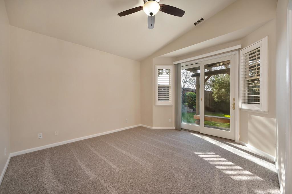9594 Prost Court Elk Grove, CA 95758 - Photo 26 of 46 a view of an empty room with a window