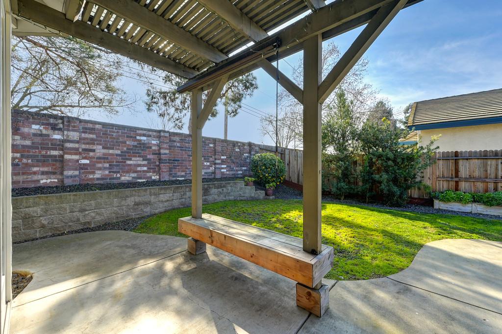 9594 Prost Court Elk Grove, CA 95758 - Photo 38 of 46 a view of swimming pool with a patio and a yard