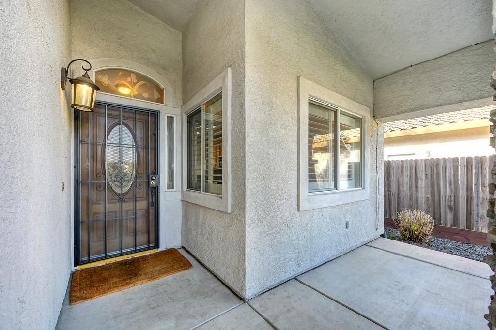 9594 Prost Court Elk Grove, CA 95758 - Photo 7 of 46 a view of an entryway with a door