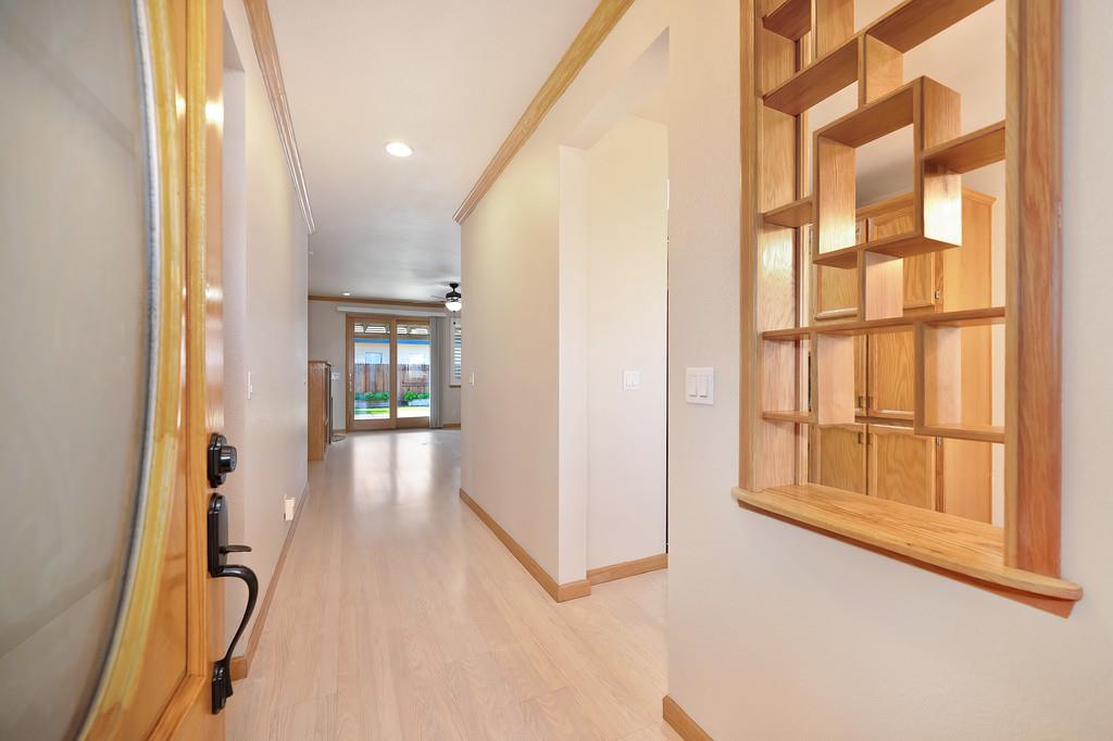 9594 Prost Court Elk Grove, CA 95758 - Photo 8 of 46 a view of an entryway with wooden floor