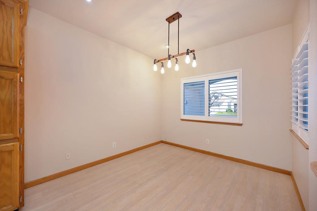 9594 Prost Court Elk Grove, CA 95758 - Photo 10 of 46 a view of a room with a ceiling fan and window