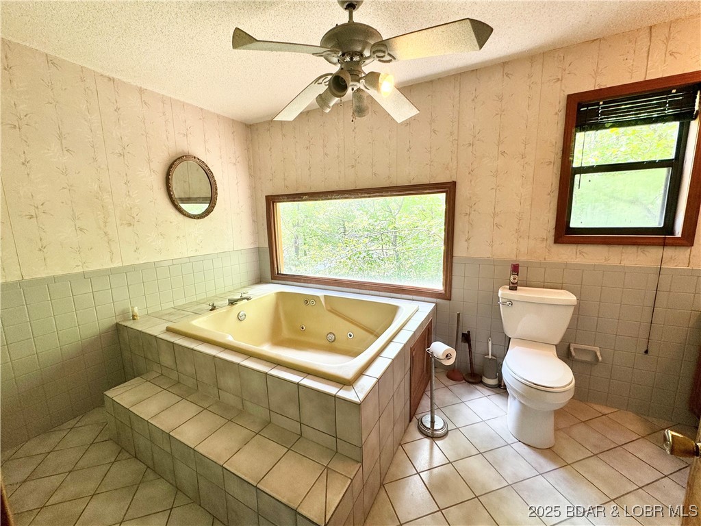 624 Lake Placid Road Stover, MO 65078 - Photo 4 of 48 Large tub with a view of the lake