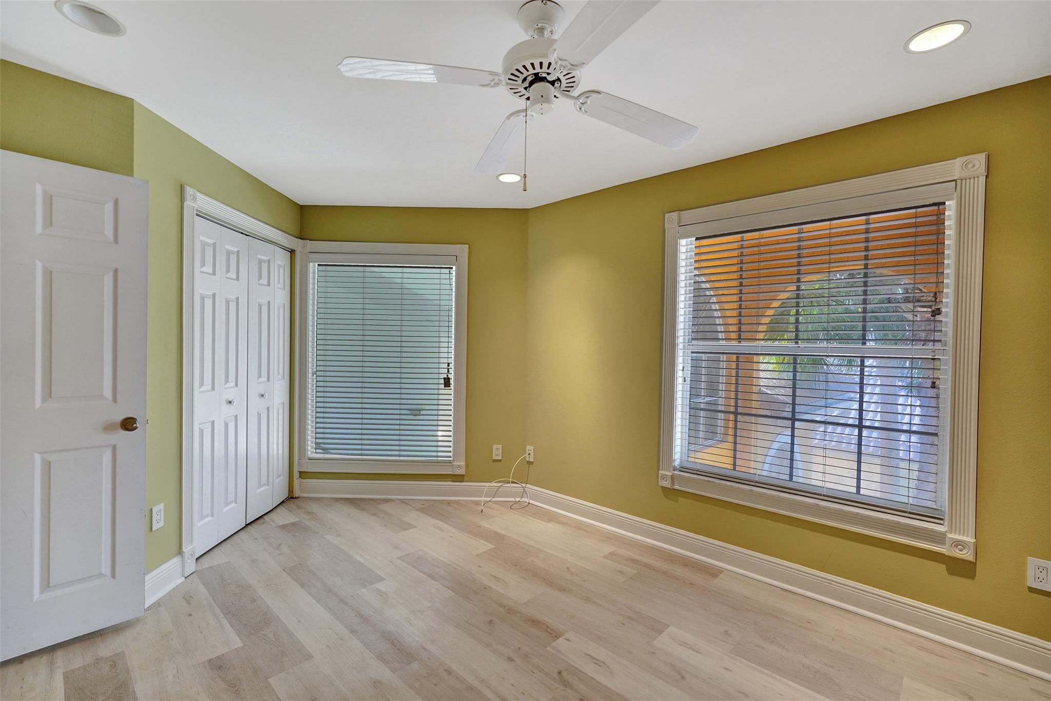10902 Tamoron Lane Boca Raton, FL 33498 - Photo 51 of 66 a view of livingroom with window ceiling fan and windows