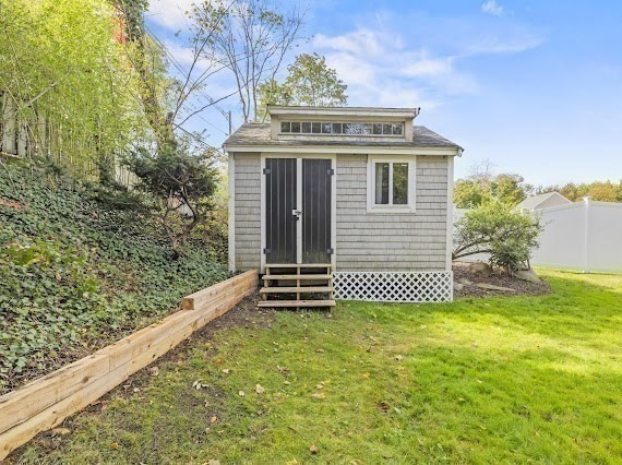 50 First Parish Road Scituate, MA 02066 - Photo 31 of 42 a front view of a house with a garden