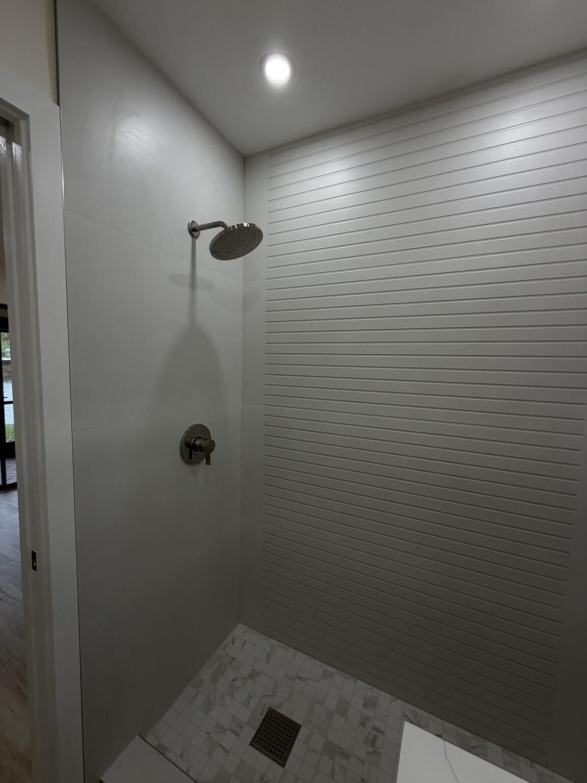 705 Banks Road Margate, FL 33063 - Photo 16 of 44 a bathroom with a shower