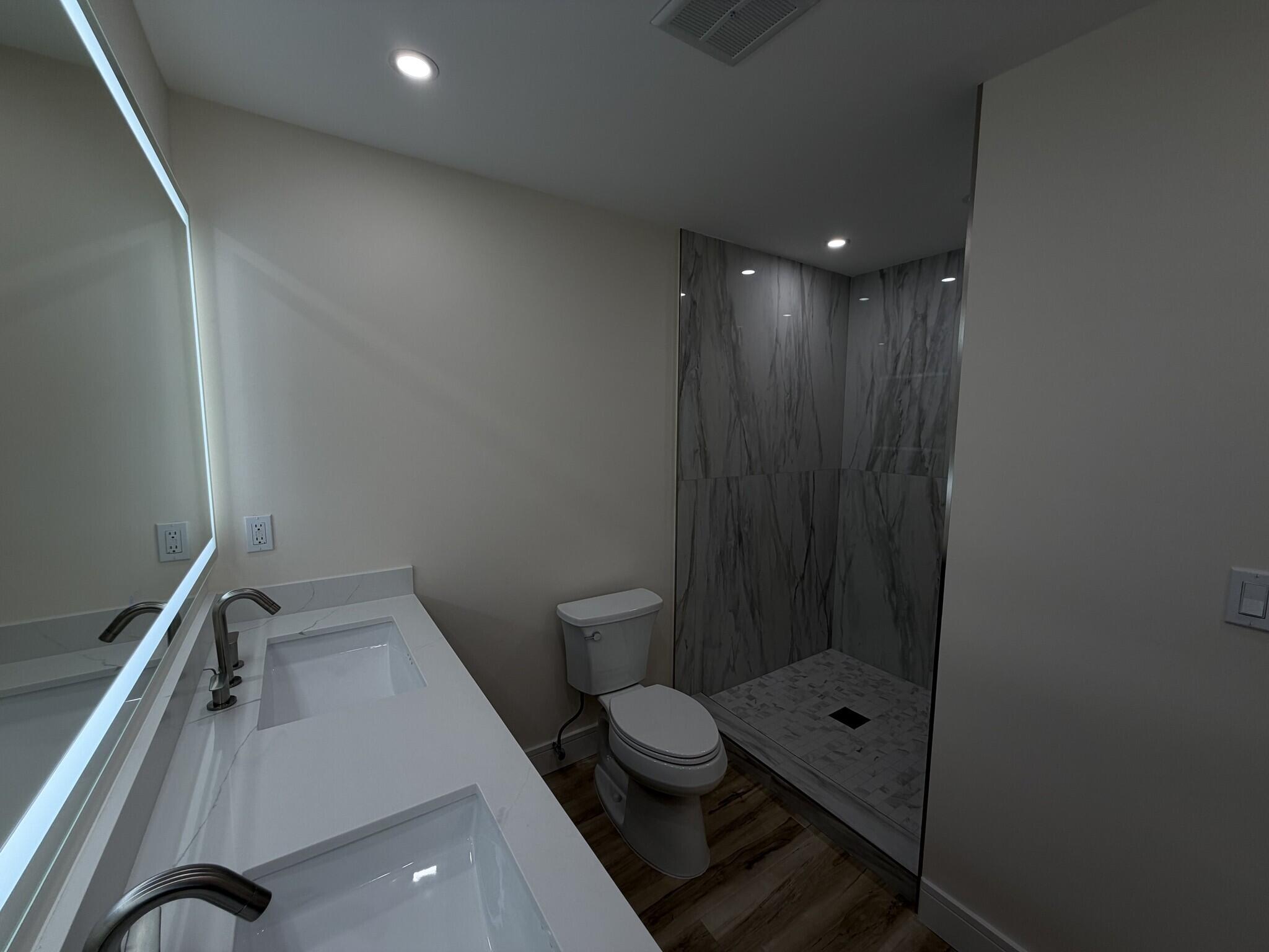 705 Banks Road Margate, FL 33063 - Photo 26 of 44 a bathroom with a sink and a toilet