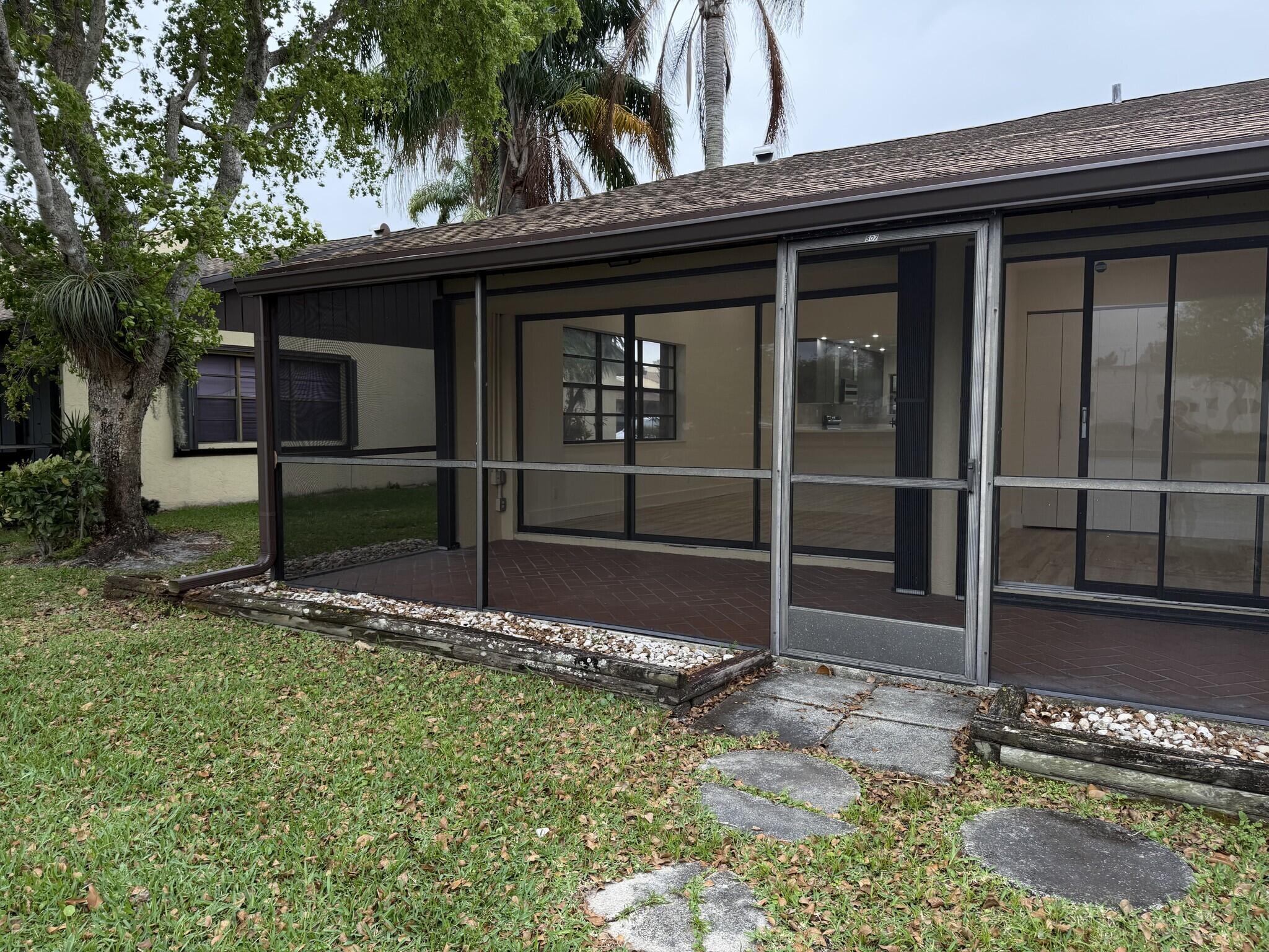705 Banks Road Margate, FL 33063 - Photo 39 of 44 a view of back yard of the house