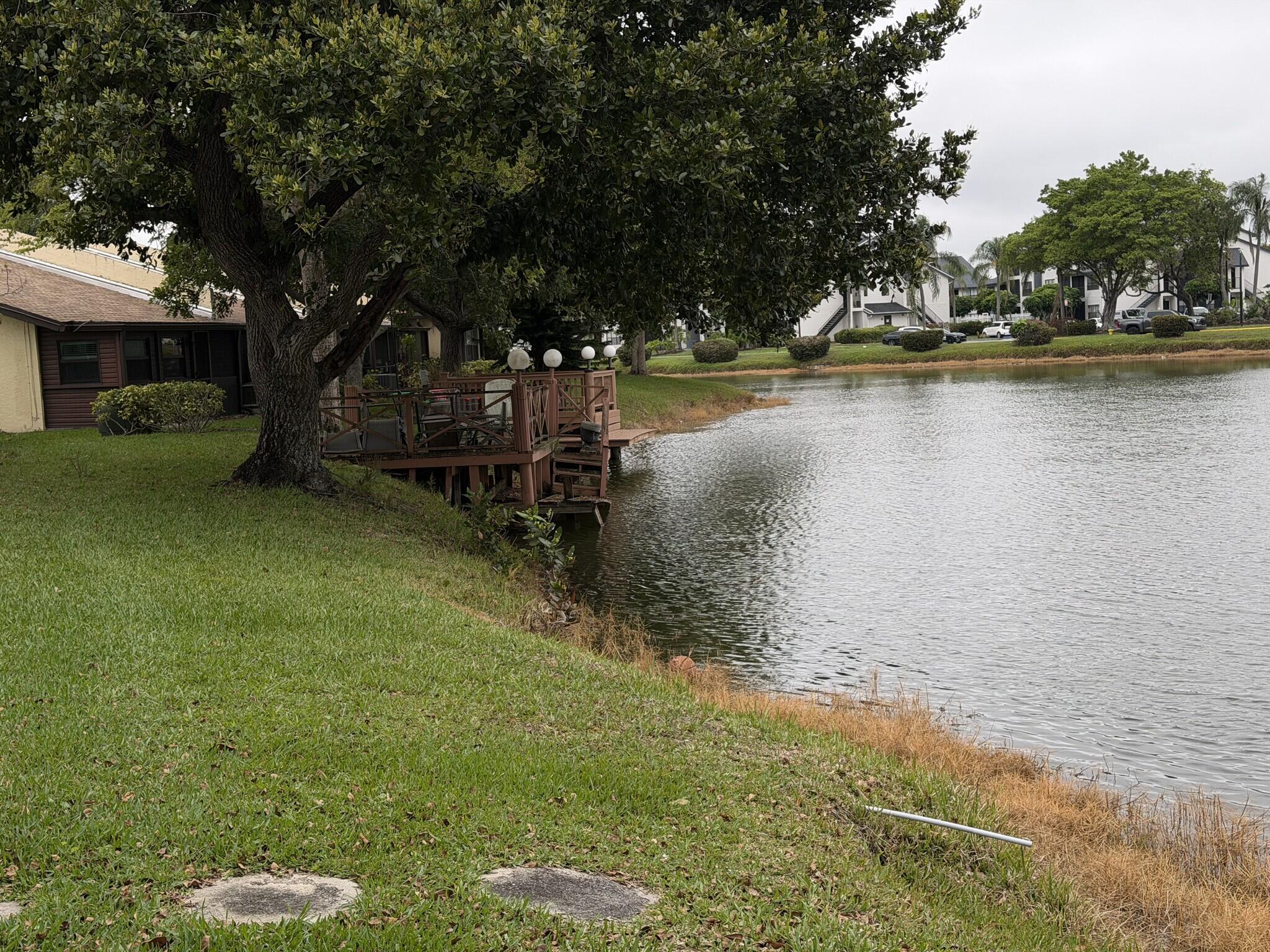 705 Banks Road Margate, FL 33063 - Photo 40 of 44 a view of a lake with houses