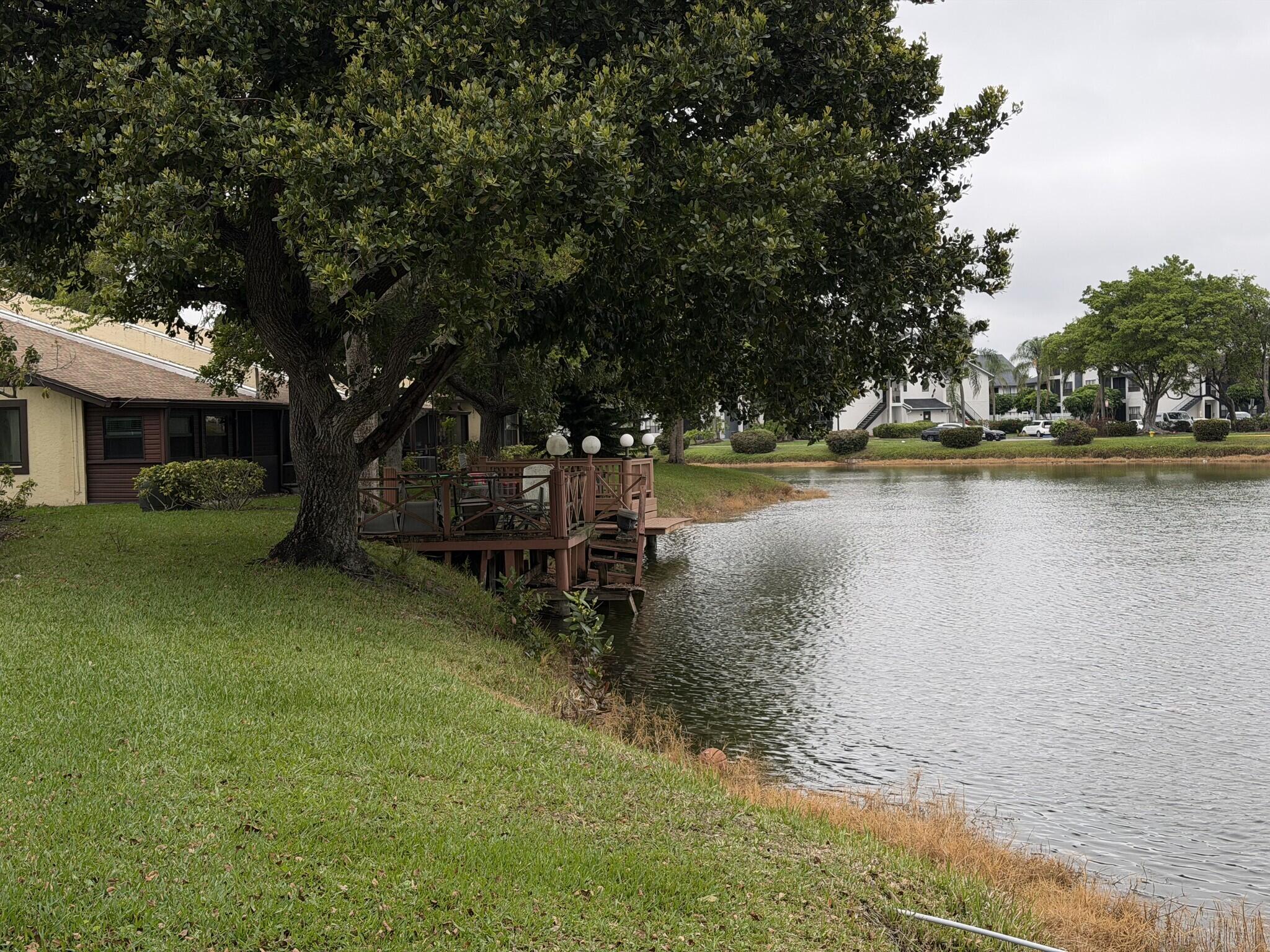 705 Banks Road Margate, FL 33063 - Photo 41 of 44 a view of a lake with houses