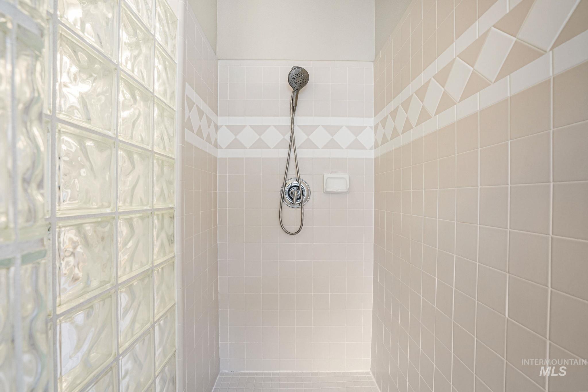 5790 North Wellspring Way Boise, ID 83713 - Photo 22 of 41 Bathroom with a tile shower