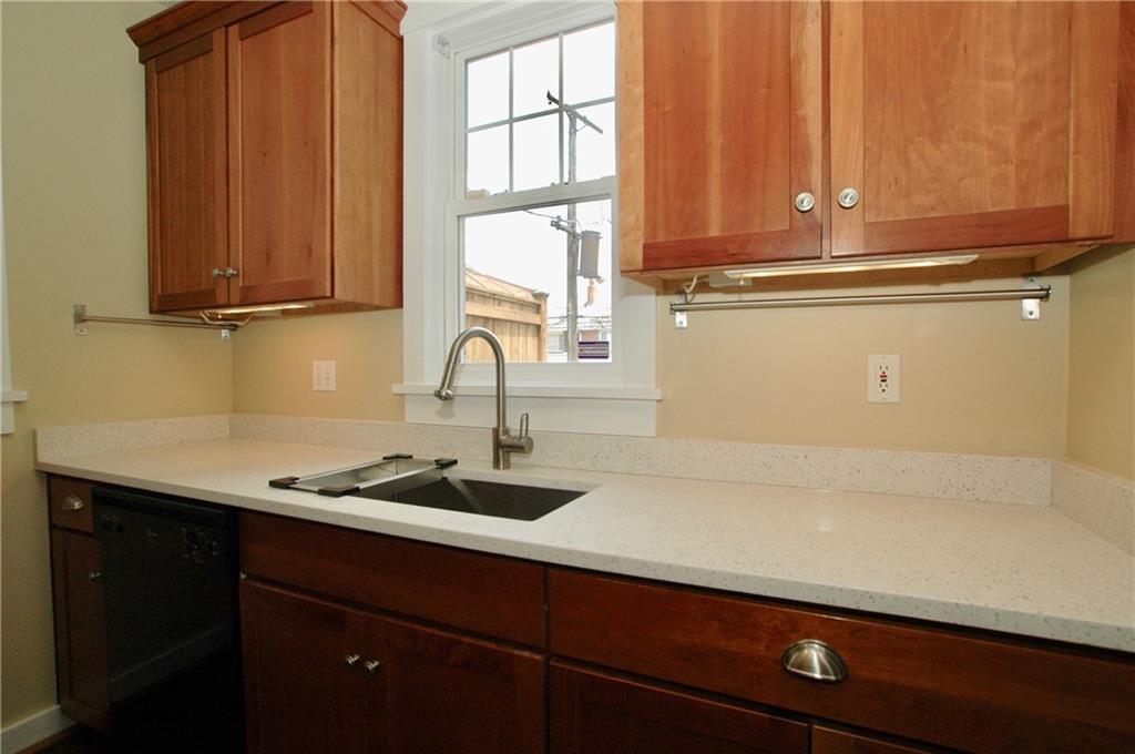 2 Dawson Court Pittsburgh, PA 15213 - Photo 11 of 34 Quartz counters, sink overlooking deck, under-cabinet lights