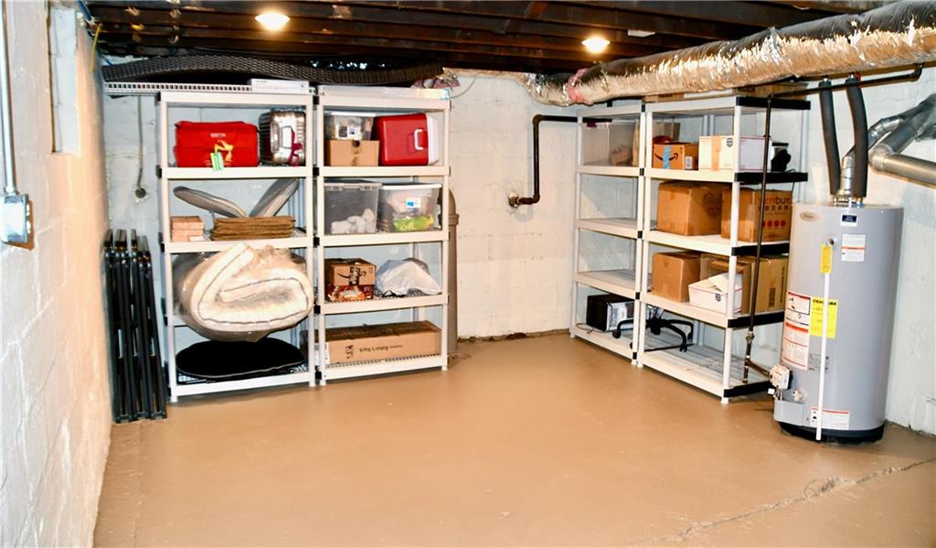 2 Dawson Court Pittsburgh, PA 15213 - Photo 26 of 34 Basement, light and bright, with provided shelving