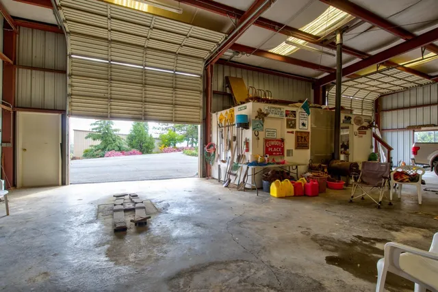 a view of a lake with houses in back