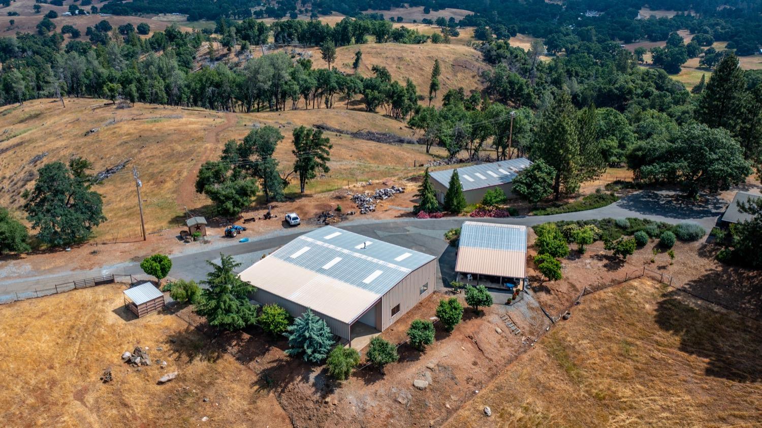 7279 Mountain Ranch Road Mountain Ranch, CA 95246 - Photo 46 of 69 an aerial view of a house with a garden
