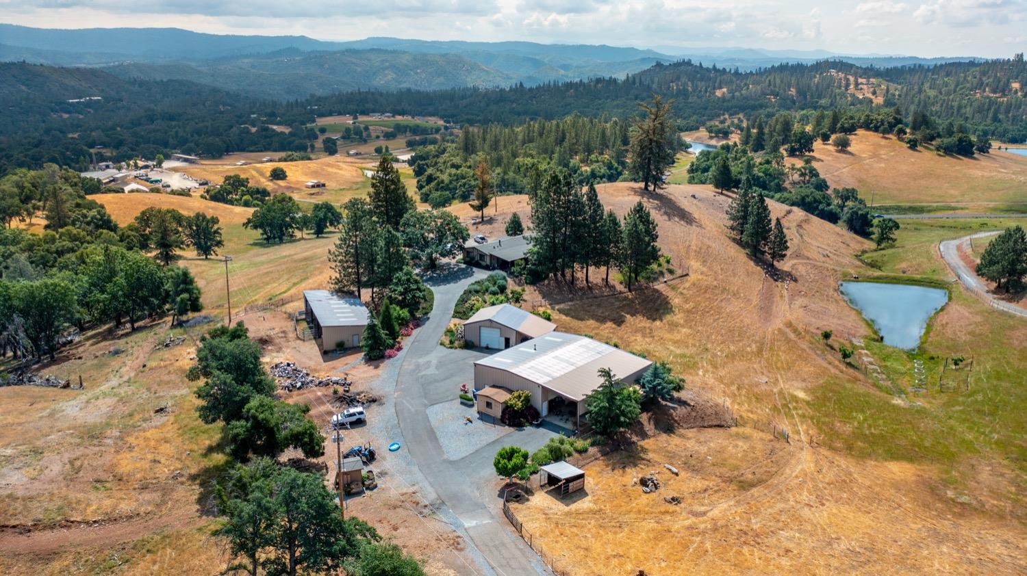 7279 Mountain Ranch Road Mountain Ranch, CA 95246 - Photo 52 of 69 an aerial view of houses with a lake