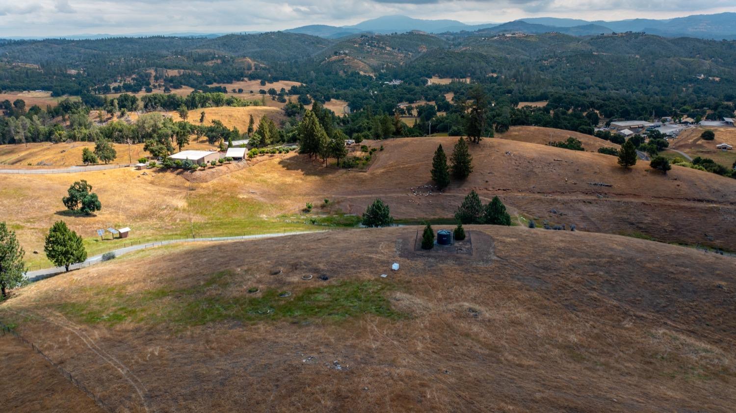 7279 Mountain Ranch Road Mountain Ranch, CA 95246 - Photo 66 of 69 a view of a town with mountains in the background