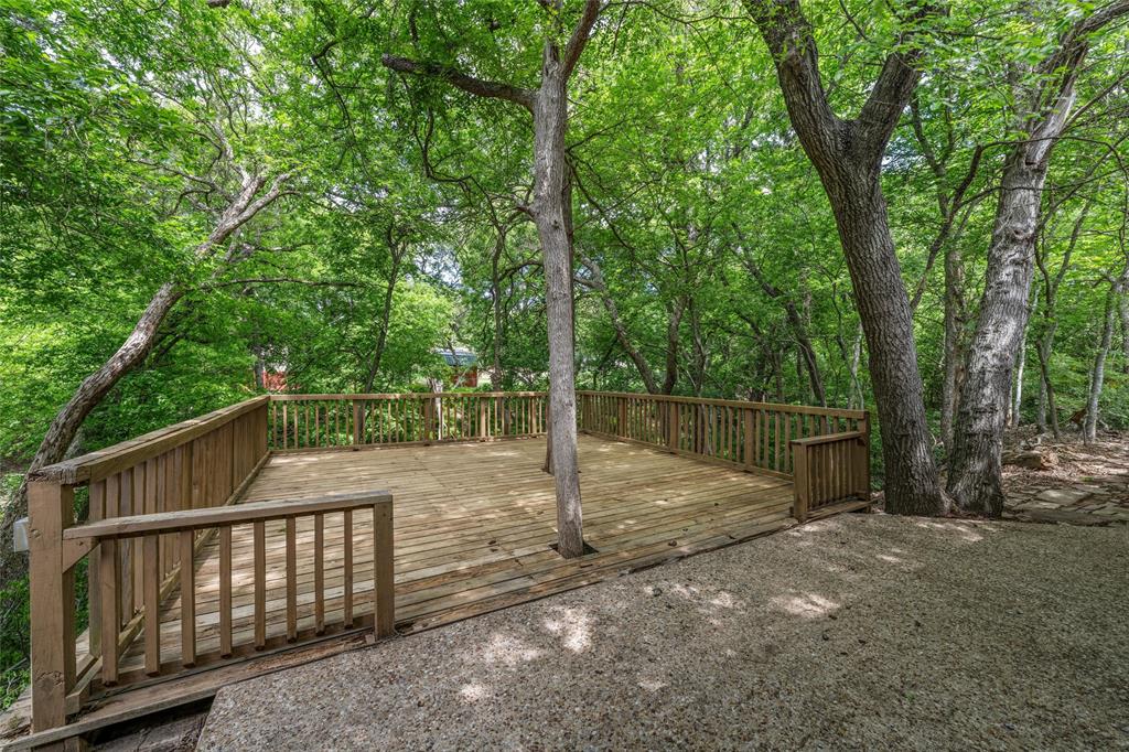 7821 Tallahassee Road Woodway, TX 76712 - Photo 25 of 31 a view of backyard with green space